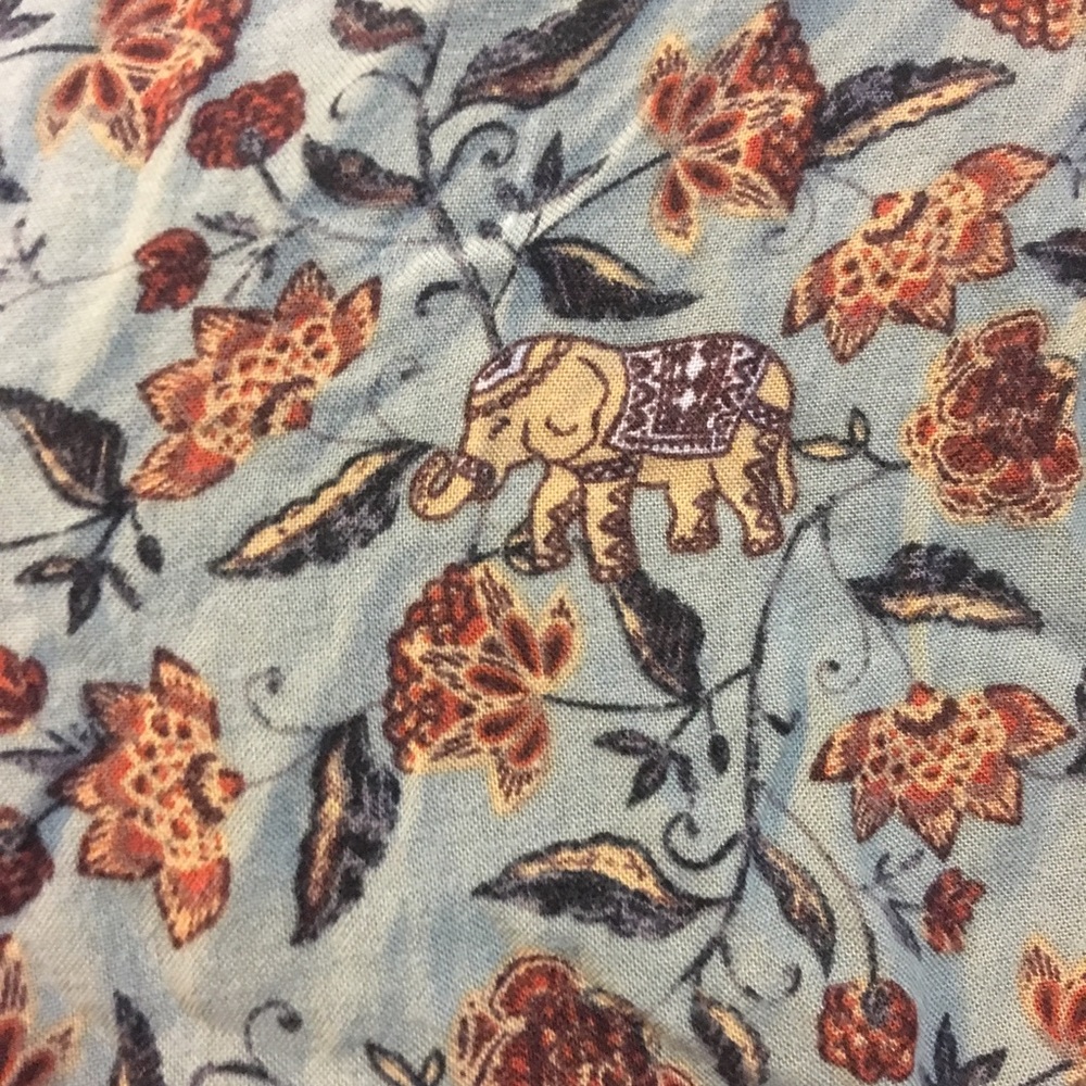 Mock wrap elephant print romper!